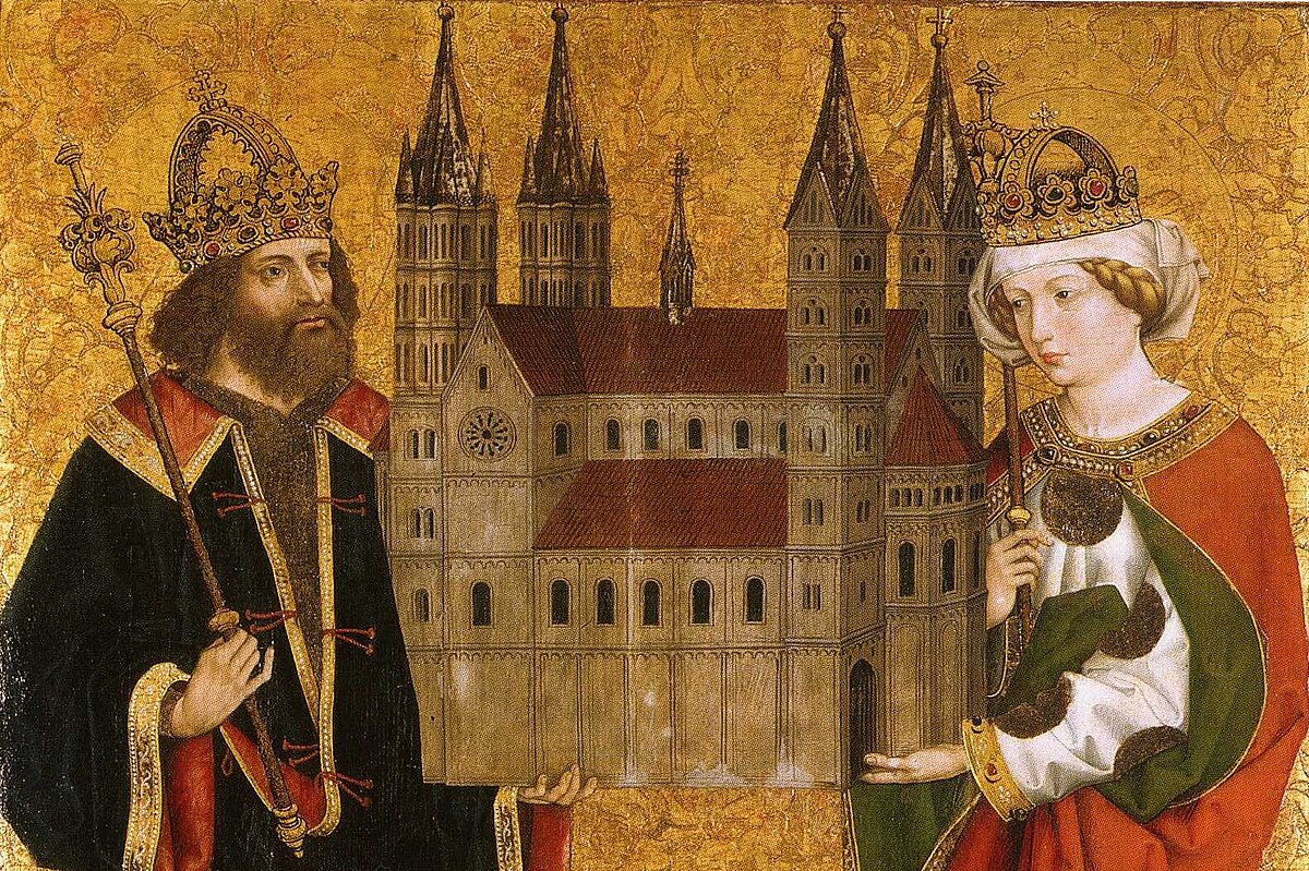 Historische kolorierte Darstellung des Kaiserpaares, links Heinrich II. und rechts Kunigunde, beide in herrschaftlicher Kleidung, zwischen sich halten sie ein Modell des Bamberger Doms